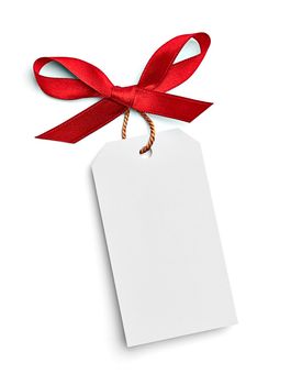 close up of a note card with red ribbon bow on white background