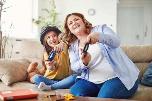 mother and daughter playing and having fun at home