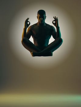 Meditation shadow, float or relax man meditate in spiritual mental health, chakra energy balance or soul aura healing. Zen mindset peace, mindfulness or model silhouette isolated on studio background.