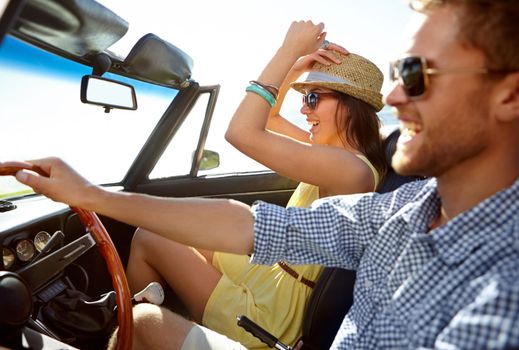 Car road trip, travel profile and happy couple on bonding holiday adventure, transportation journey or fun summer vacation. Love flare, convertible automobile and driver driving on Canada countryside.