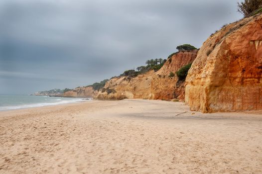 Maria Luisa beach with rock formation in Albufeira, Algarve, Portugal.