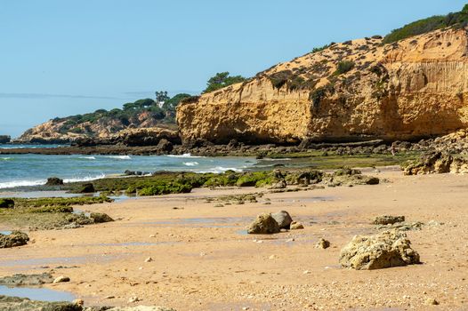 Maria Luisa beach with rock formation in Albufeira, Algarve, Portugal.