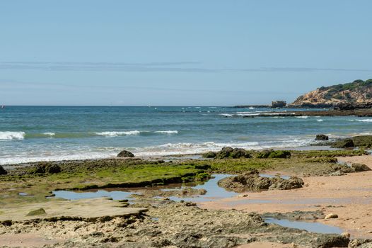 Maria Luisa beach with rock formation in Albufeira, Algarve, Portugal.