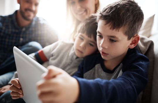 Thinking children, bonding or tablet in movies streaming, esports or social media in house living room or family home. Brothers, boys or kids on digital technology, education learning or team gaming.