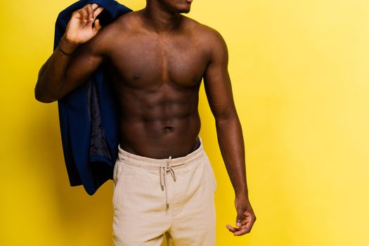 Like what you see. A handsome and muscular young man posing in studio.