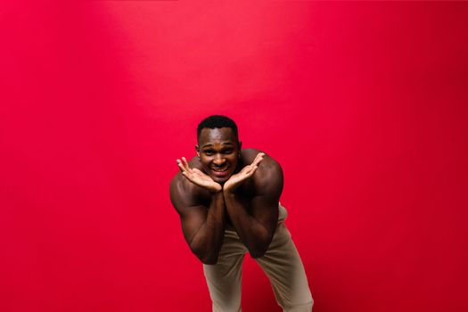 Like what you see. A handsome and muscular young man posing in studio.