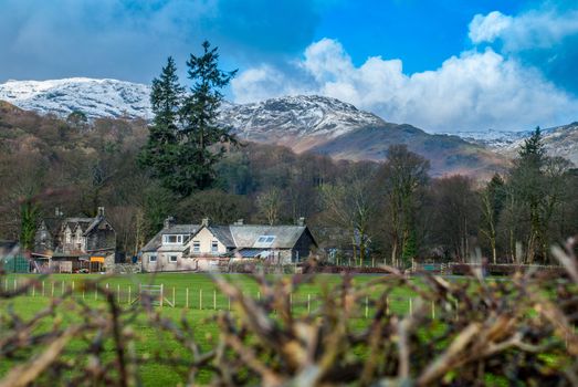 A small village in the Lake District area that has a beautiful backdrop of mountains