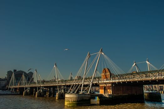 London, UK - Feb 25, 2019 : Hungerfold Bridge and Goldden Jubilee Bridge in London, UK