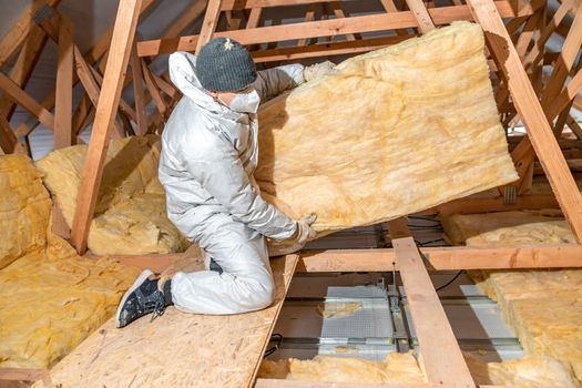 insulation of the roof and ceiling with glass wool.