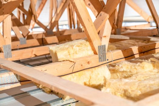 insulation of the roof and ceiling with glass wool.