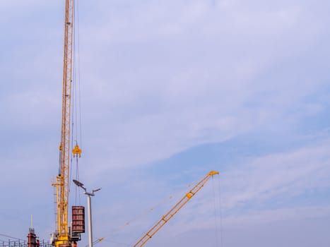 The Tower crane working in construction site