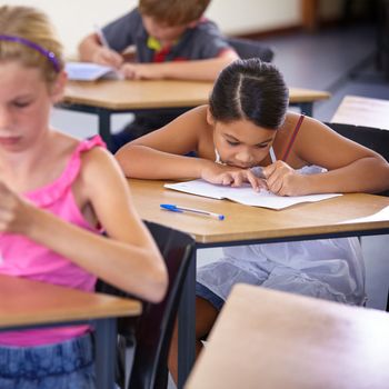 Nobody likes a pop quiz. students at their desks