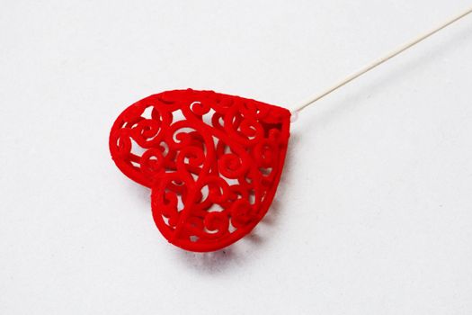 Valentine's Day concept. Copy space. red heart on a stick.