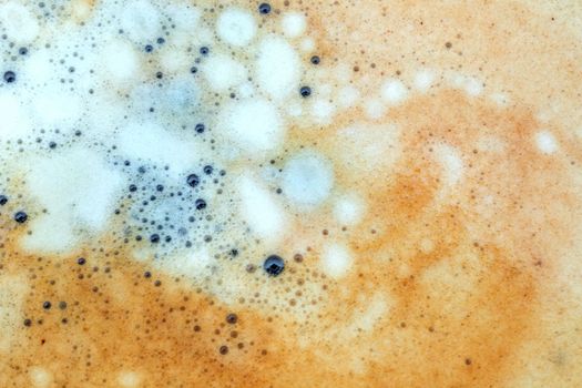 The surface of coffee foam. Macro. Abstract, Detail texture, close up background.