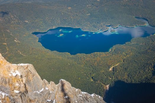 Eibsee lake from above Zugspitze at dramatic autumn landscape, Garmisch, Germany, border with Austria Tyrol