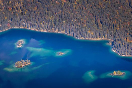 Eibsee lake from above Zugspitze at dramatic autumn landscape, Garmisch, Germany, border with Austria Tyrol