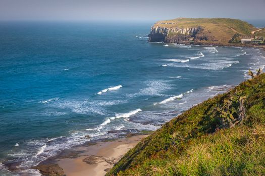 Guarita Beach in Torres city at summer sunny day, Rio Grande do Sul state, Southern Brazil