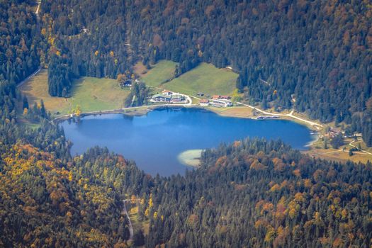Eibsee lake from above Zugspitze at dramatic autumn landscape, Garmisch, Germany, border with Austria Tyrol