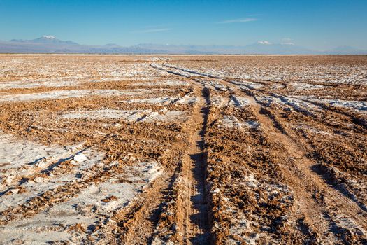 Dirt Road in Peaceful Moon Valley dramatic landscape at Sunset, Atacama Desert, Chile