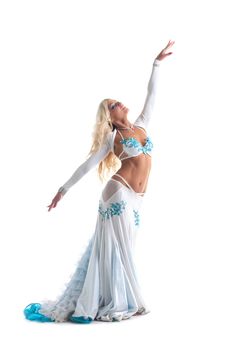 middle age blond woman dance in white oriental arabic costume isolated