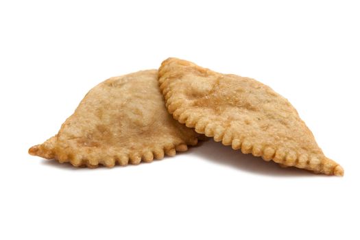 Two tasty pasties. Isolated on white