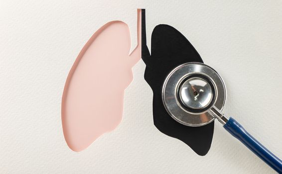 World Tuberculosis Day. Top view of lungs paper symbol black pink and medical stethoscope on white background, lung cancer awareness, concept of world TB day, Healthcare and medicine concept