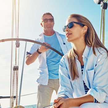 Relax, travel and luxury with couple on yacht for summer, love and sunset on Rome vacation trip. Adventure, journey and ship with man and woman sailing on boat for ocean and tropical honeymoon at sea.