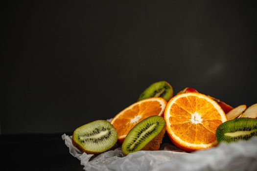 Luxurious fruit background. Studio photography of various fruits isolated on black background. Copy space. high resolution product