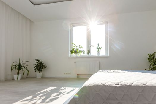 Abstract white waving curtain in white bedroom apartment