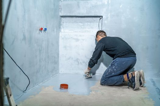 waterproofing of the bathroom floor in a new building.