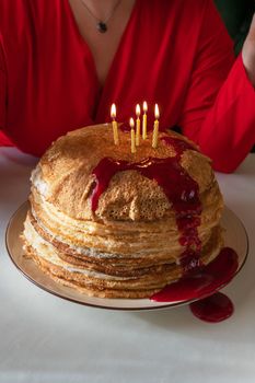 Pancakes with berries jam and 5 candles
