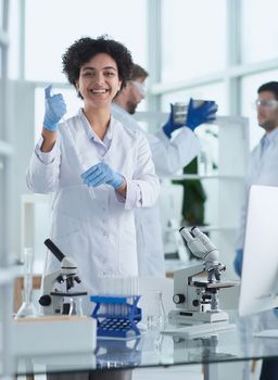 Scientists smiling together in lab