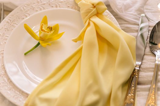 Elegant table setting with floral decor.Beautiful table setting with floral decor