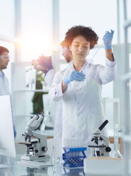 Scientists smiling together in lab