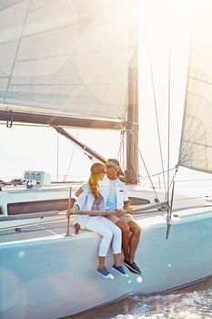 Relax, travel and luxury with couple on yacht for summer, love and sunset on Rome vacation trip. Adventure, journey and vip with man and woman sailing on boat for ocean, tropical and honeymoon at sea.