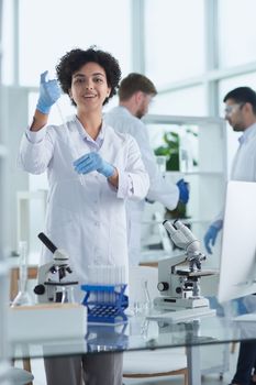 Scientists smiling together in lab