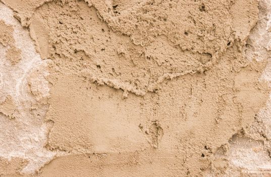 Fragment of unevenly applied plaster on the wall. copy space, place for text,