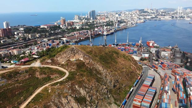 Cross Hill in Vladivostok. Aerial view. Cross at the top of Krestovaya hill and panorama of the Golden Horn bay and the city center