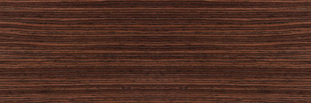 Rosewood texture. Texture of dark mahogany with an intense pattern, natural rosewood veneer for the production of furniture or yacht decoration.