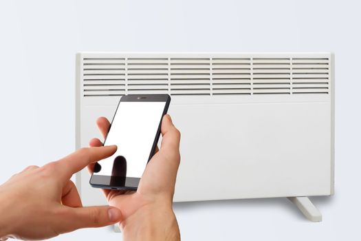 Smart heater convector control by phone app. Smart Home with the smart heating system. Electric panel heating concept