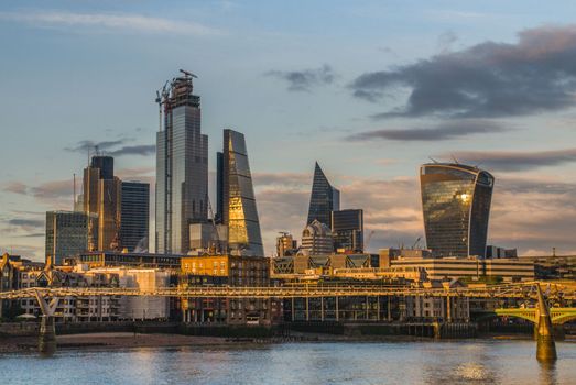 London, United Kingdom - April 17, 2019: London skyscrapers along the River Thames make the city a modern style.