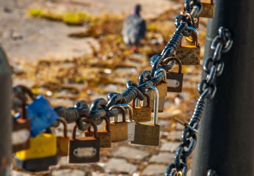 A lot of love padlocks on chain - romantic ideas of love.
