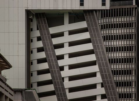 Bangkok, thailand - Mar 18, 2022 : Structure pattern of Repeating structure of Exterior multi wall at parking lot building. Architecture concept, Selective focus.