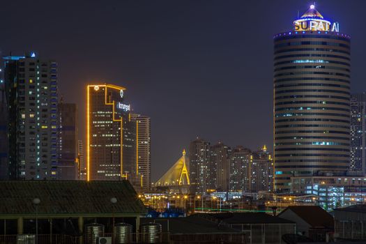 Bangkok, Thailand - 05 Apr 2020 : Bangkok downtown at night view in the business district, Beautiful twilight give the city a modern style, Selective focus.