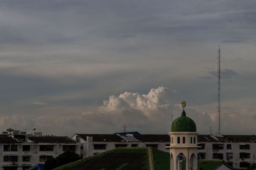 Aerial view of Mosque (Muslim mosque) at sunset in Bangkok, Islamic mosque dome, Green mosque dome, Copy space, Selective focus.