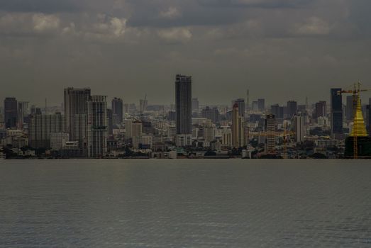 Bangkok, Thailand - Oct 05, 2019 : Beautiful view of city at afternoon Look through the roof top infinity pool in Bangkok.