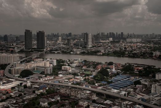 Bangkok, Thailand - Oct 05, 2019 : Beautiful view of Bangkok city, Beauty skyscrapers along Chaopraya river in the afternoon, making the city modern style.