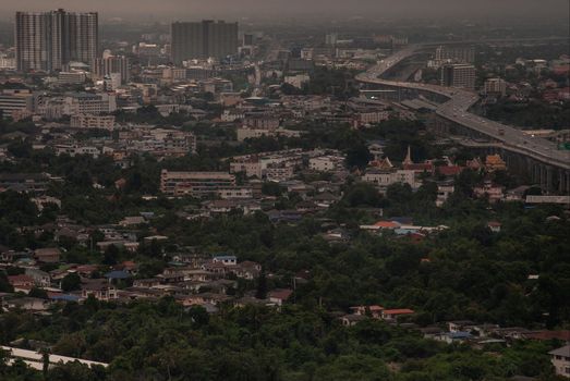 Bangkok, Thailand - Oct 05, 2019 : Aerial view of cars driving on highway junctions. Bridge roads with green garden and trees in connection of architecture concept. Top view. Urban city.