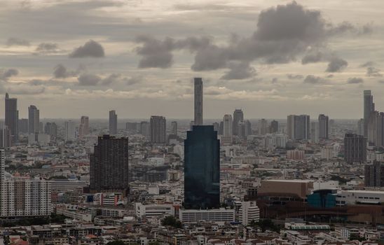 Bangkok downtown cityscape with skyscrapers at evening give the city a modern style. Selective focus.