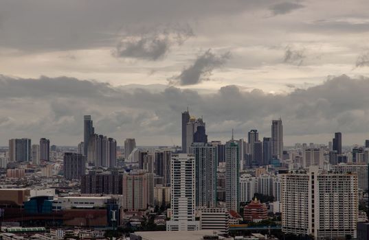 Bangkok downtown cityscape with skyscrapers at evening give the city a modern style. Selective focus.